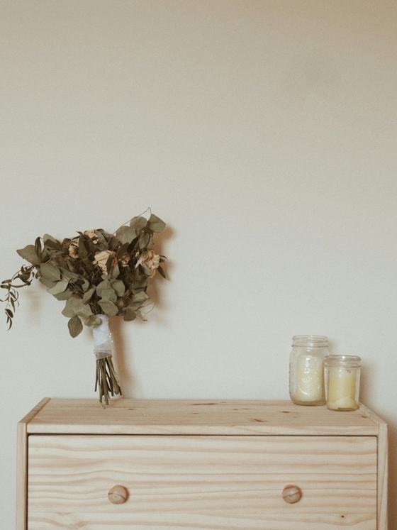 Two clear jars on desk