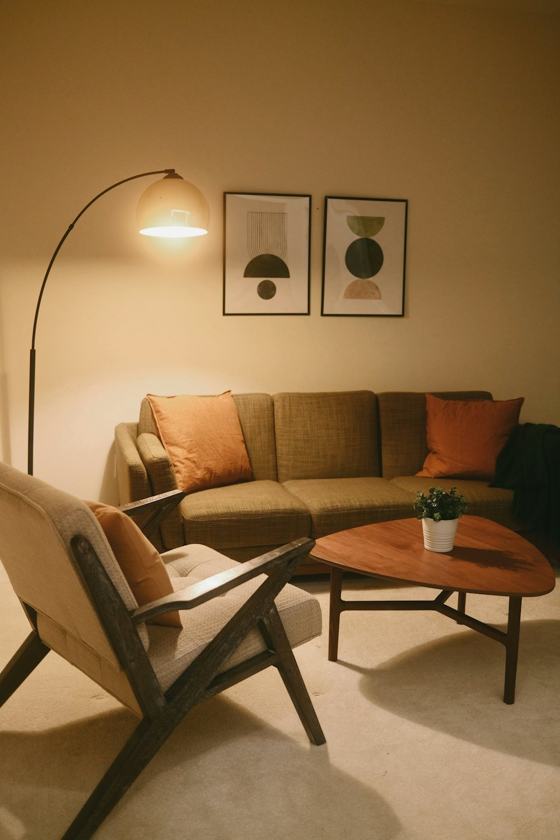 A living room with a couch and a chair