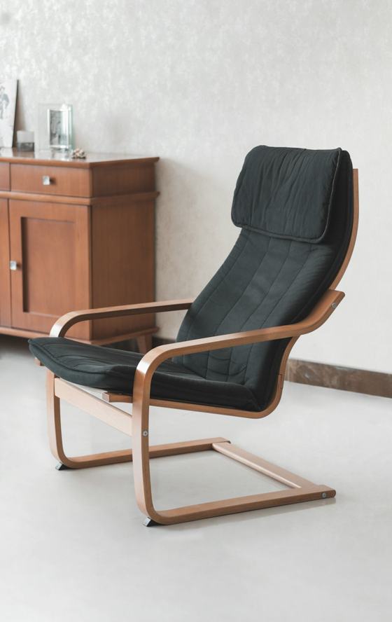 Black padded brown wooden armchair