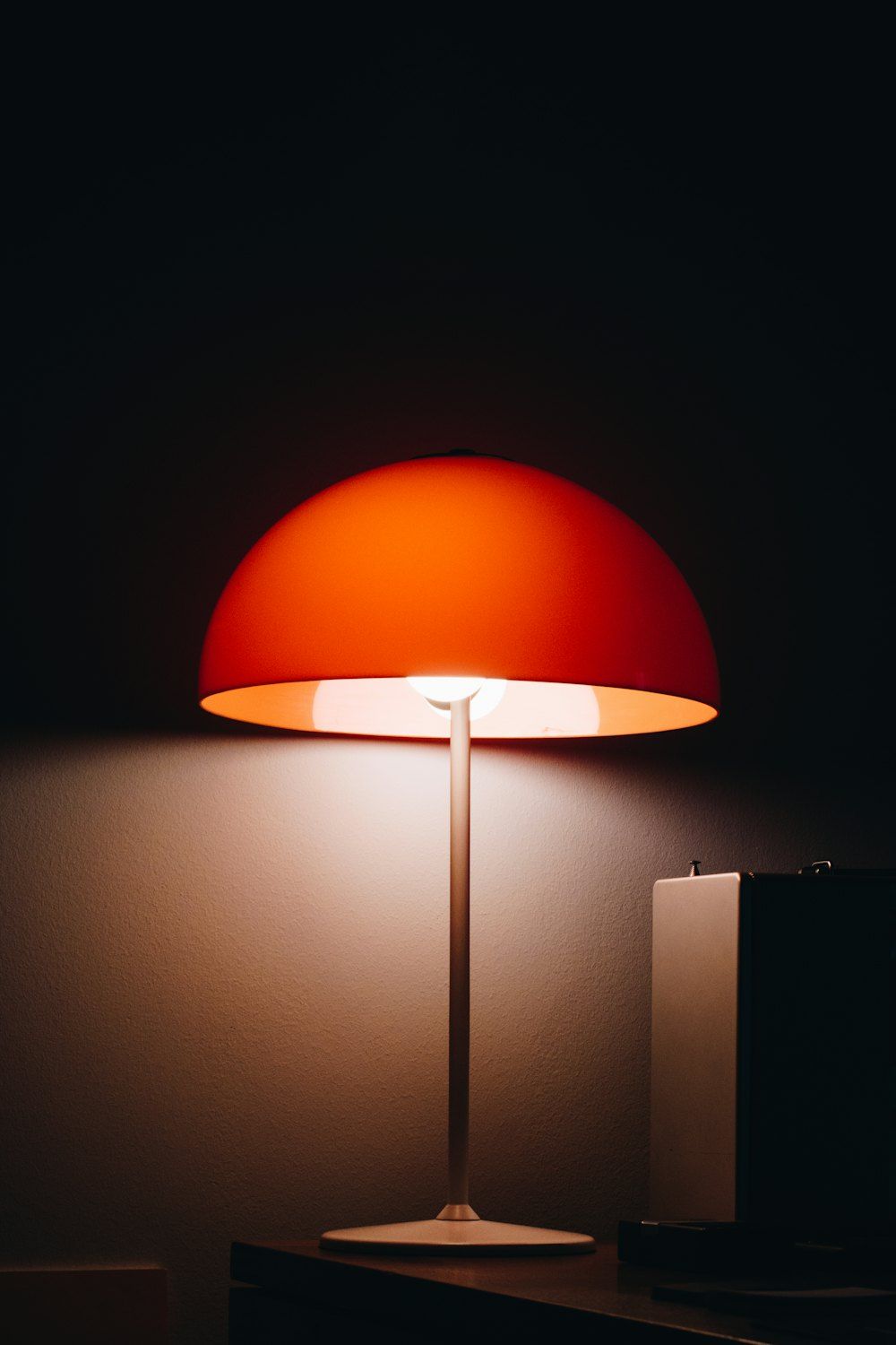 Orange and black floor lamp