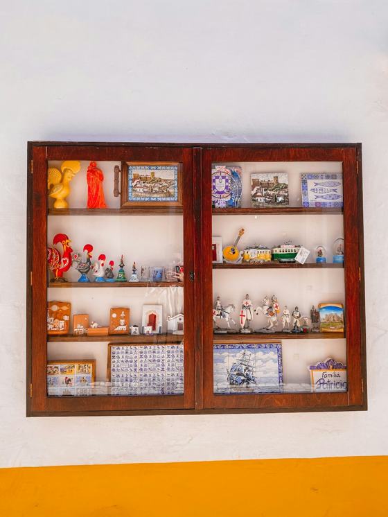 Brown wooden framed glass cabinet
