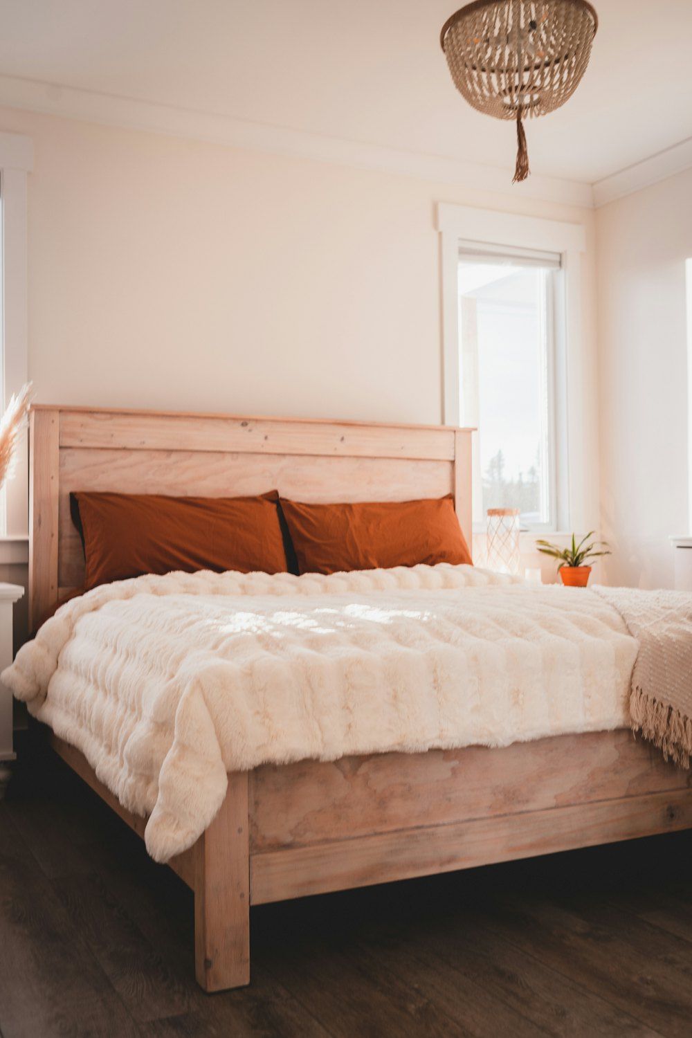 White bed linen on bed