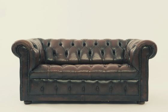 Brown leather Chesterfield sofa