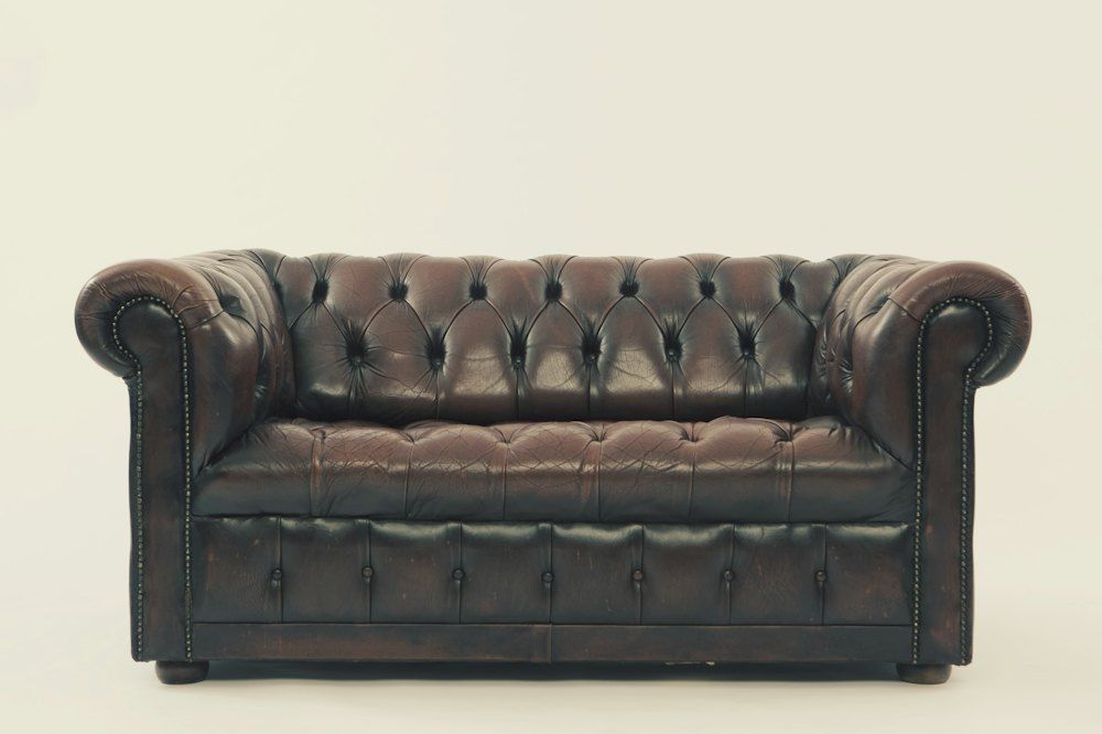 Brown leather Chesterfield sofa