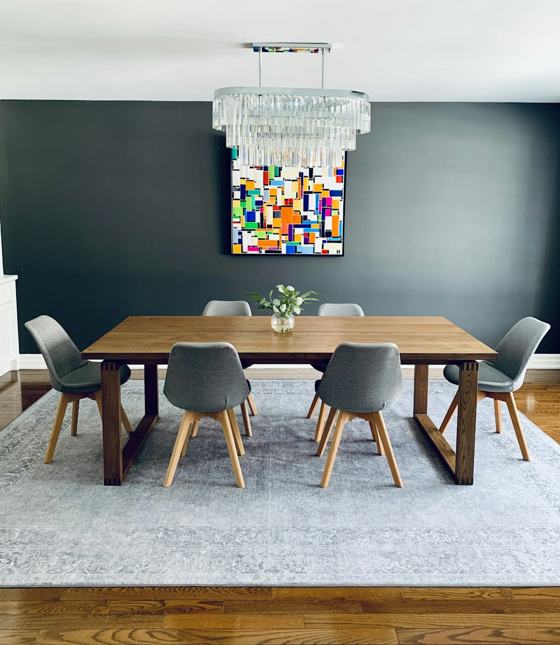 Black wooden table with chairs
