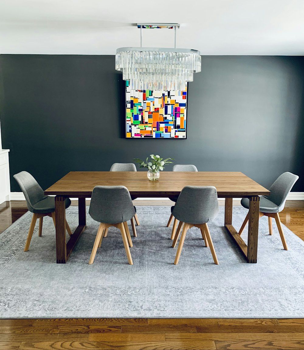 Black wooden table with chairs