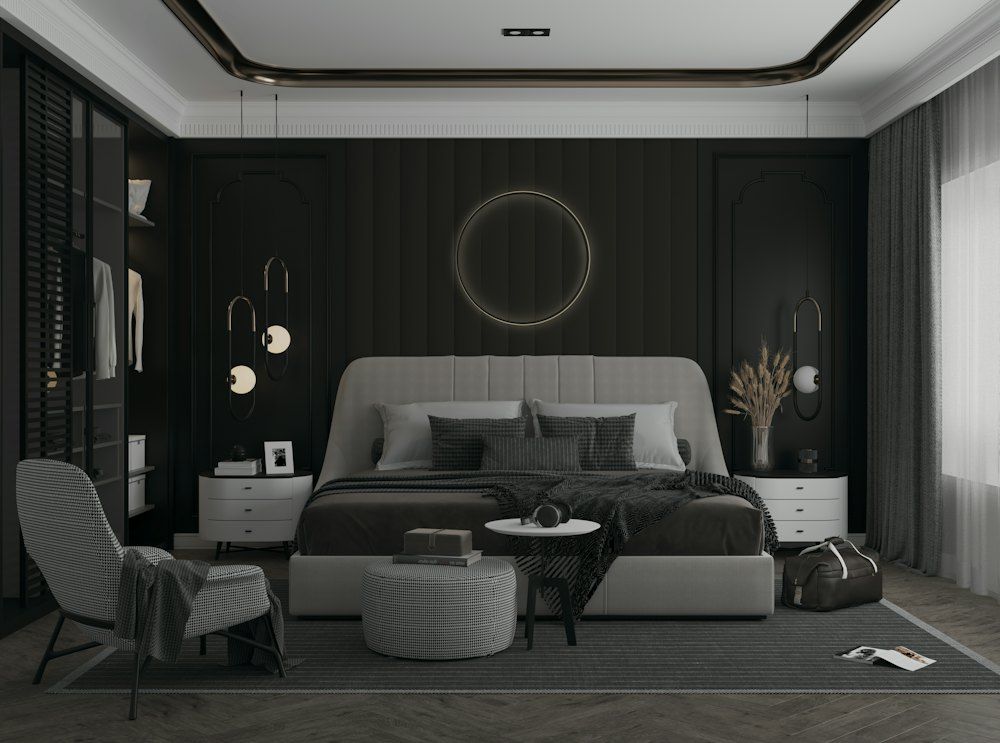 A bedroom with a large bed and a chair