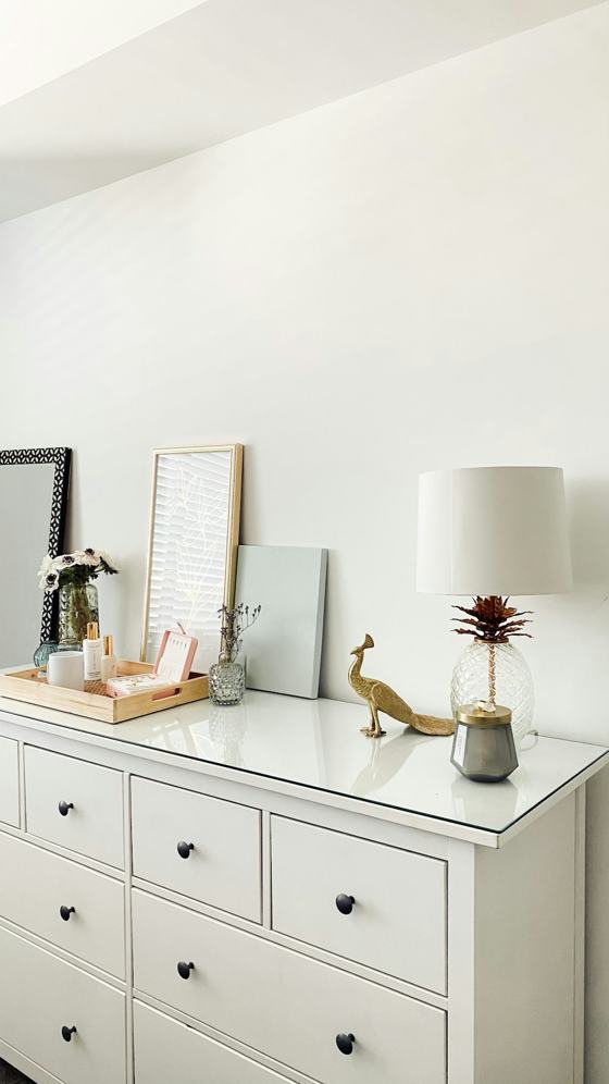 White and brown table lamp on white wooden table