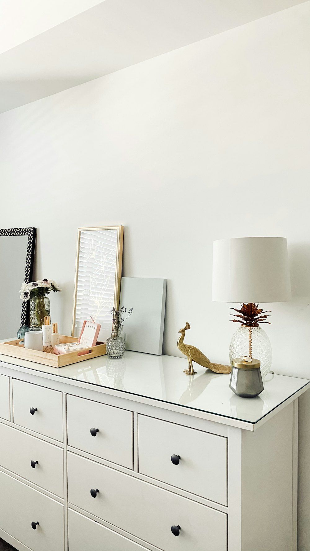White and brown table lamp on white wooden table