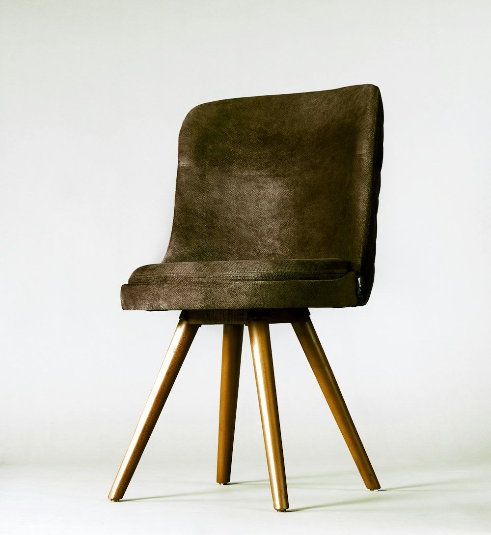 Black leather padded brown wooden seat