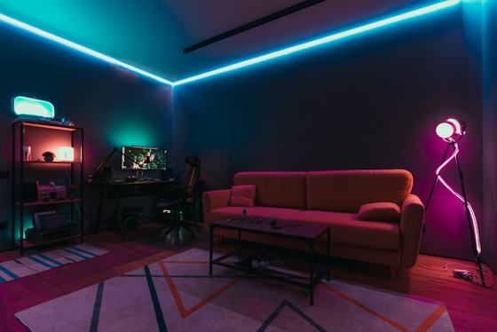 A living room with a couch and a television