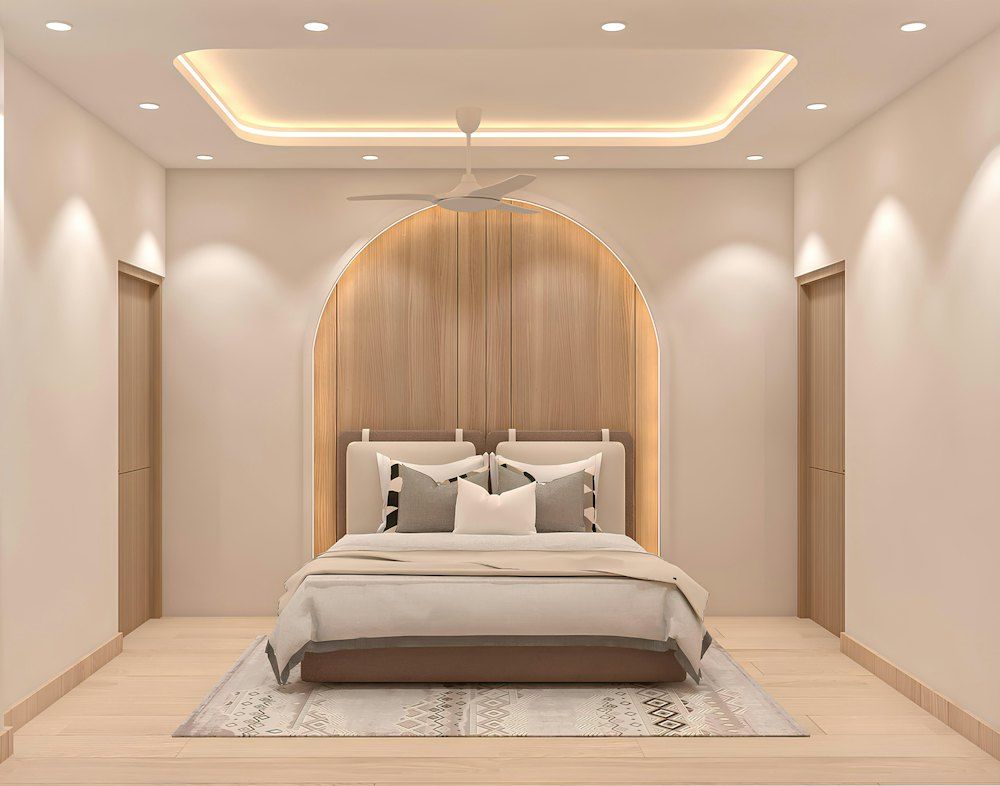 A modern bedroom with a stylish, neutral aesthetic