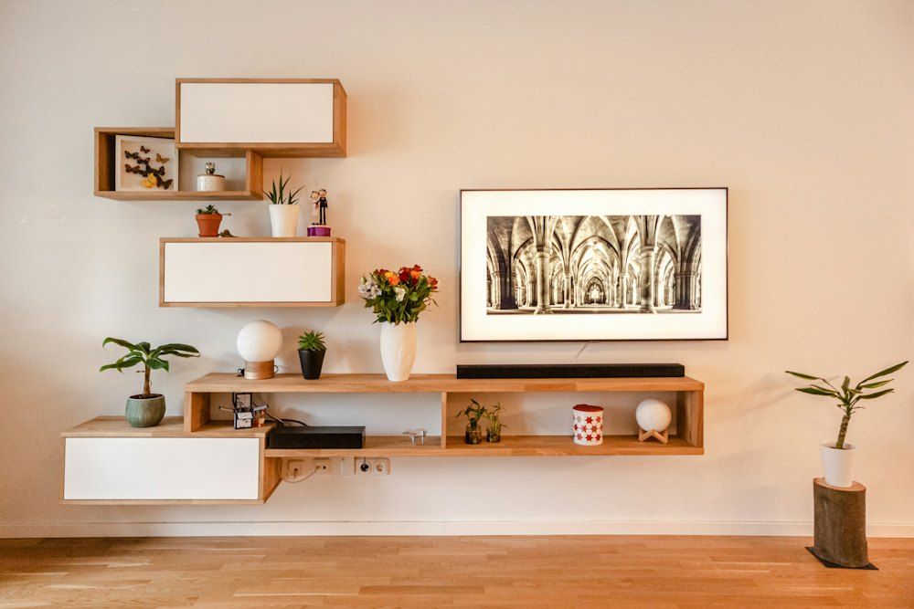 White wooden wall mounted shelf with white wooden frame