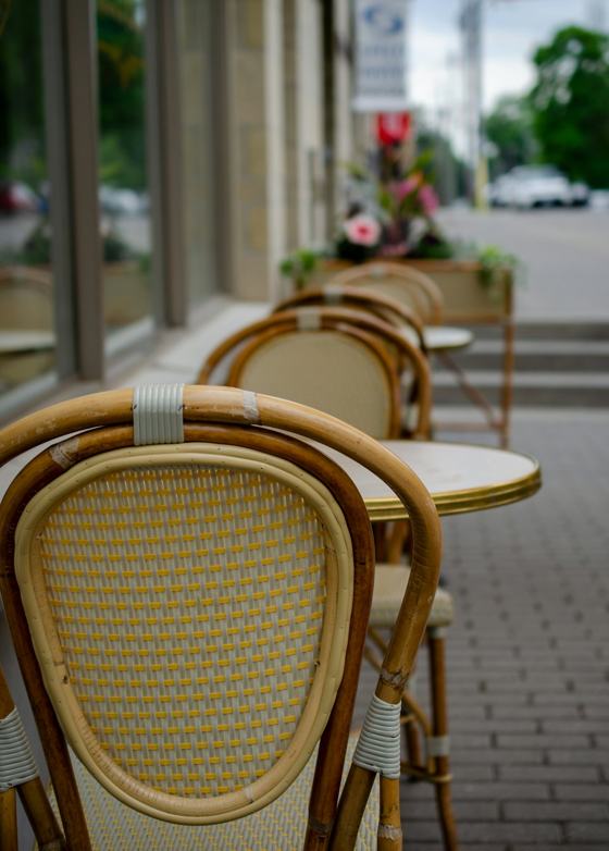 Brown wooden chair near table