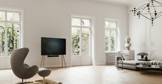 A living room with a large flat screen tv