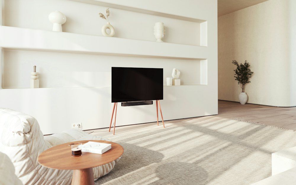 A living room with a large flat screen tv