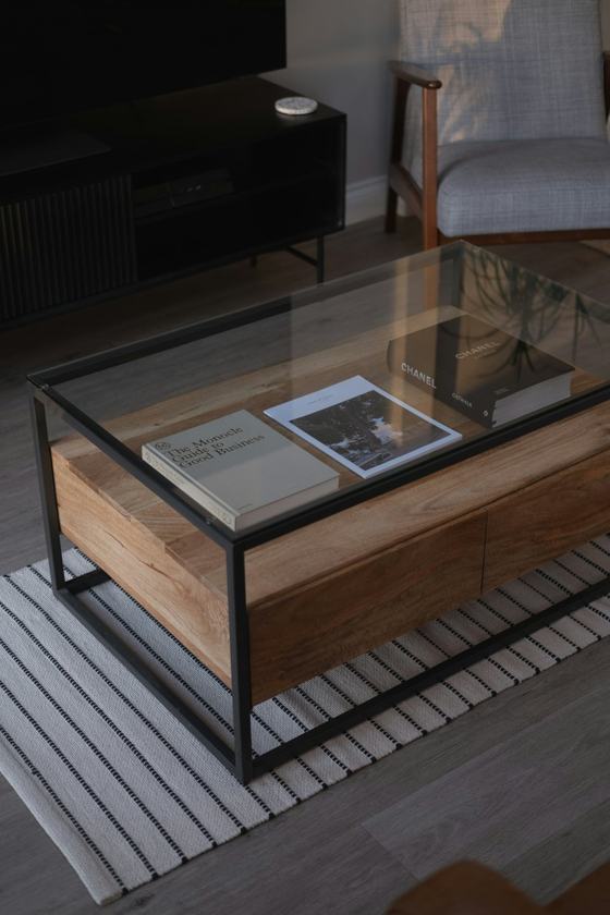 A coffee table with a book on top of it