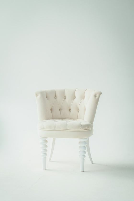 Tufted white leather sofa chair