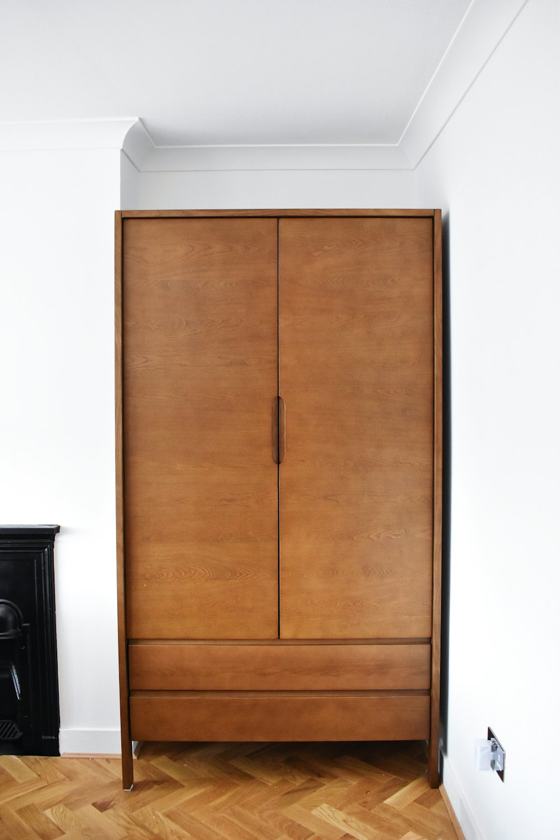 Brown wooden 2-door cabinet