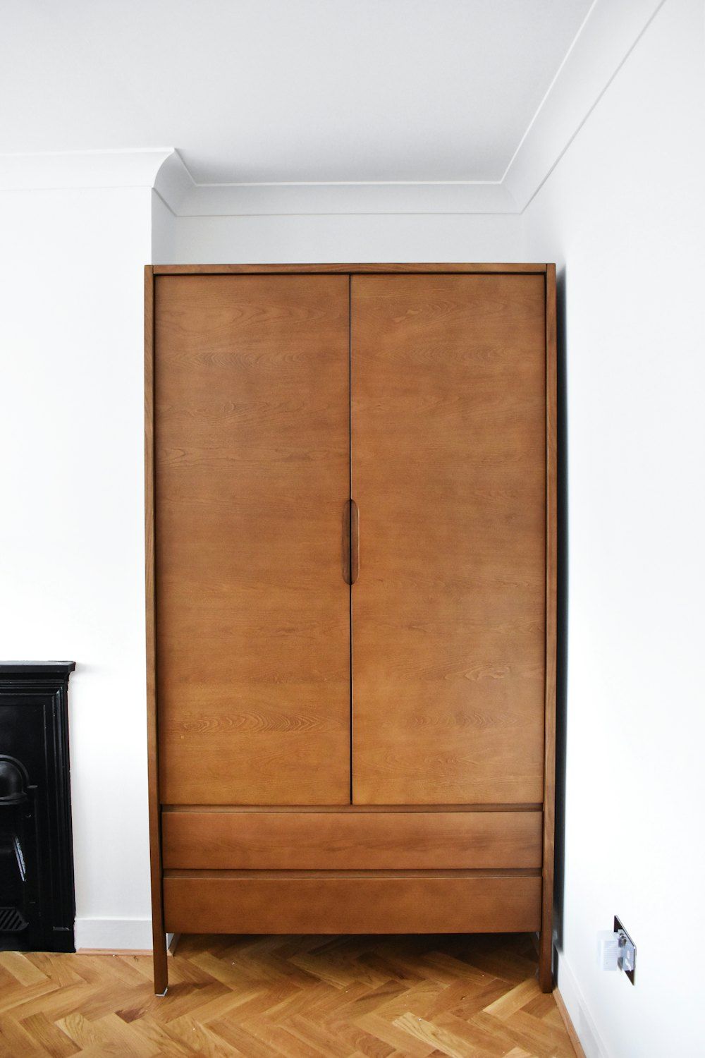 Brown wooden 2-door cabinet